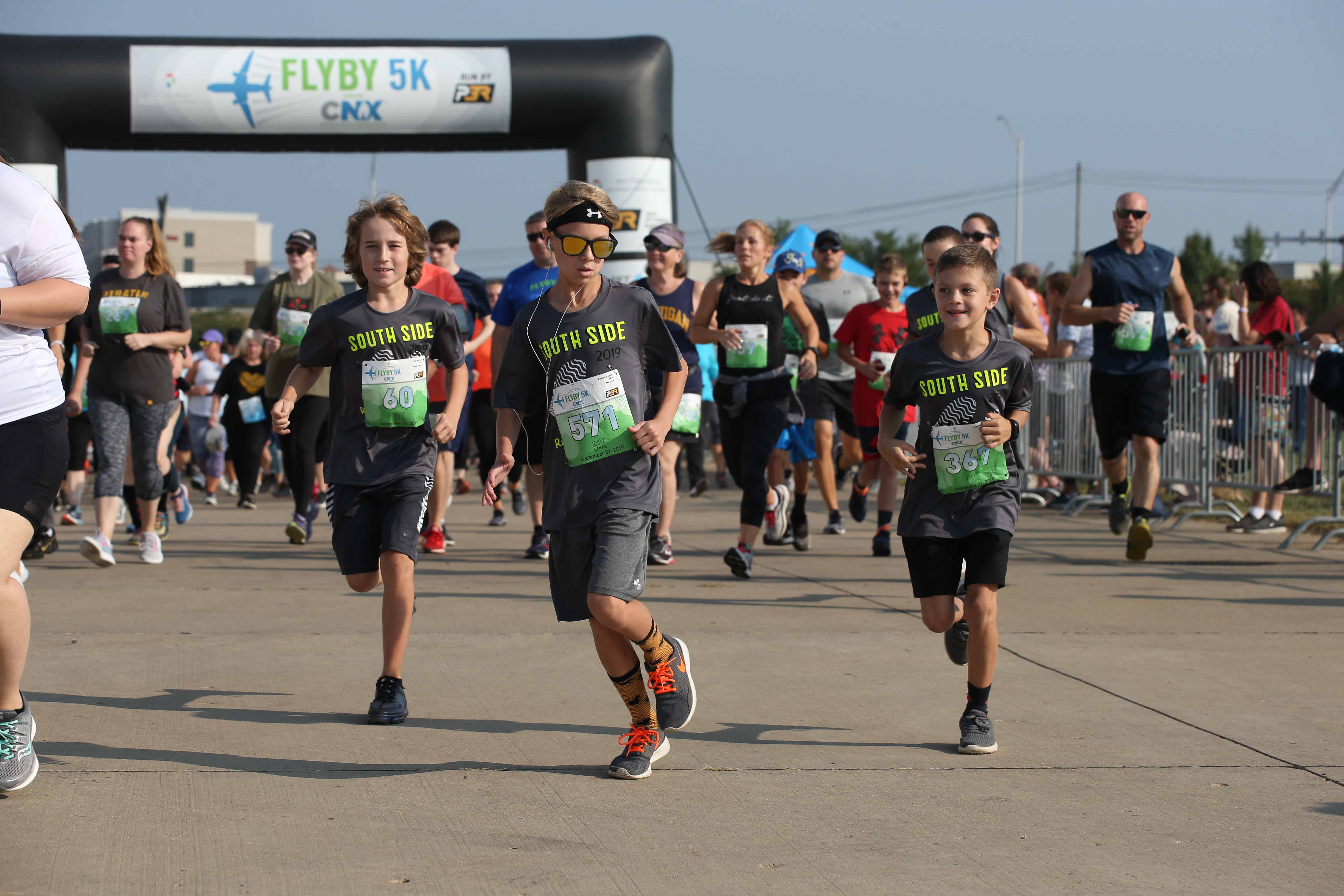 Kids running at the FlyBy 5K