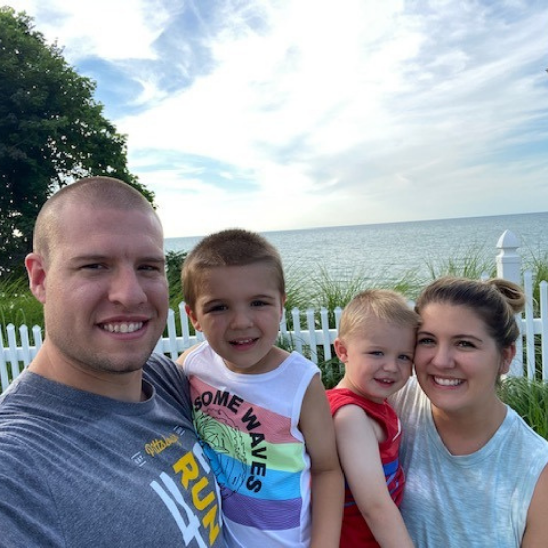 Todd Pindroh, male p3r ambassador, shown outside with his family