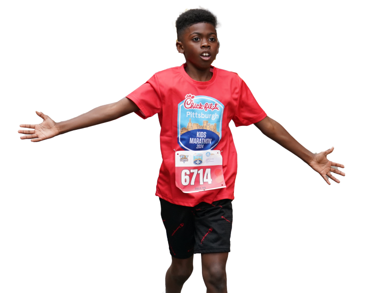 A kid running with his arms up