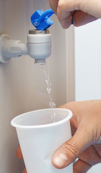 Water being poured into a cup