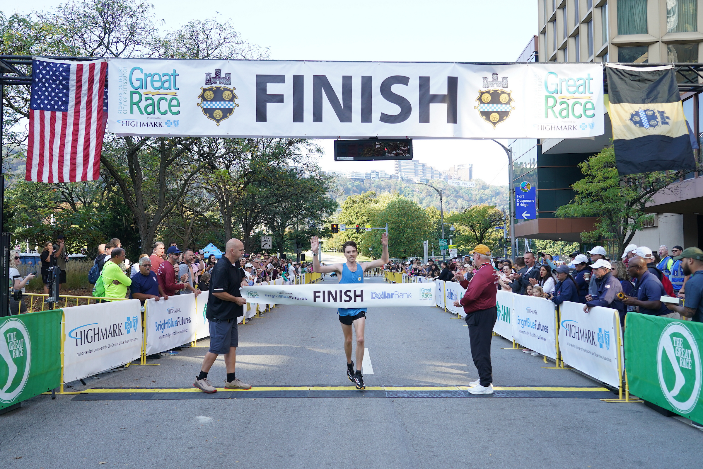 Runner breaking the "Finish" banner