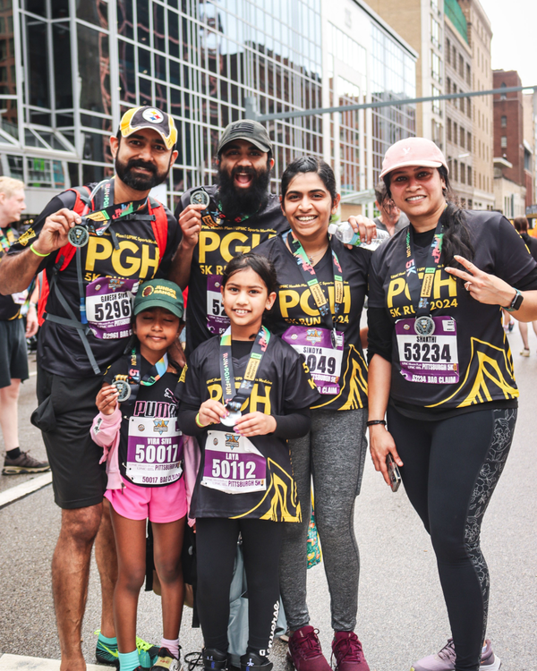 family with 5k medals