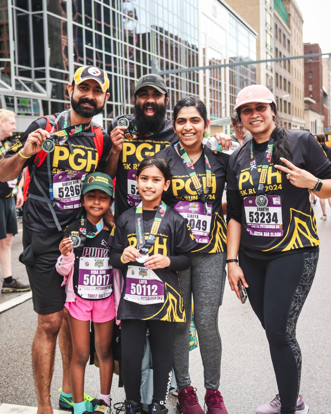 family with 5k medals