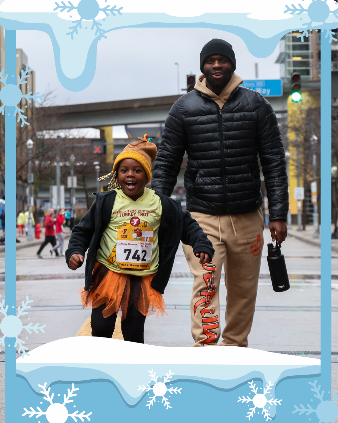 father and daughter running in cold weather gear