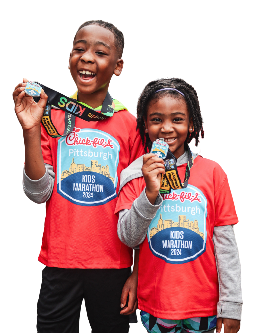 Smiling kids with finisher medals
