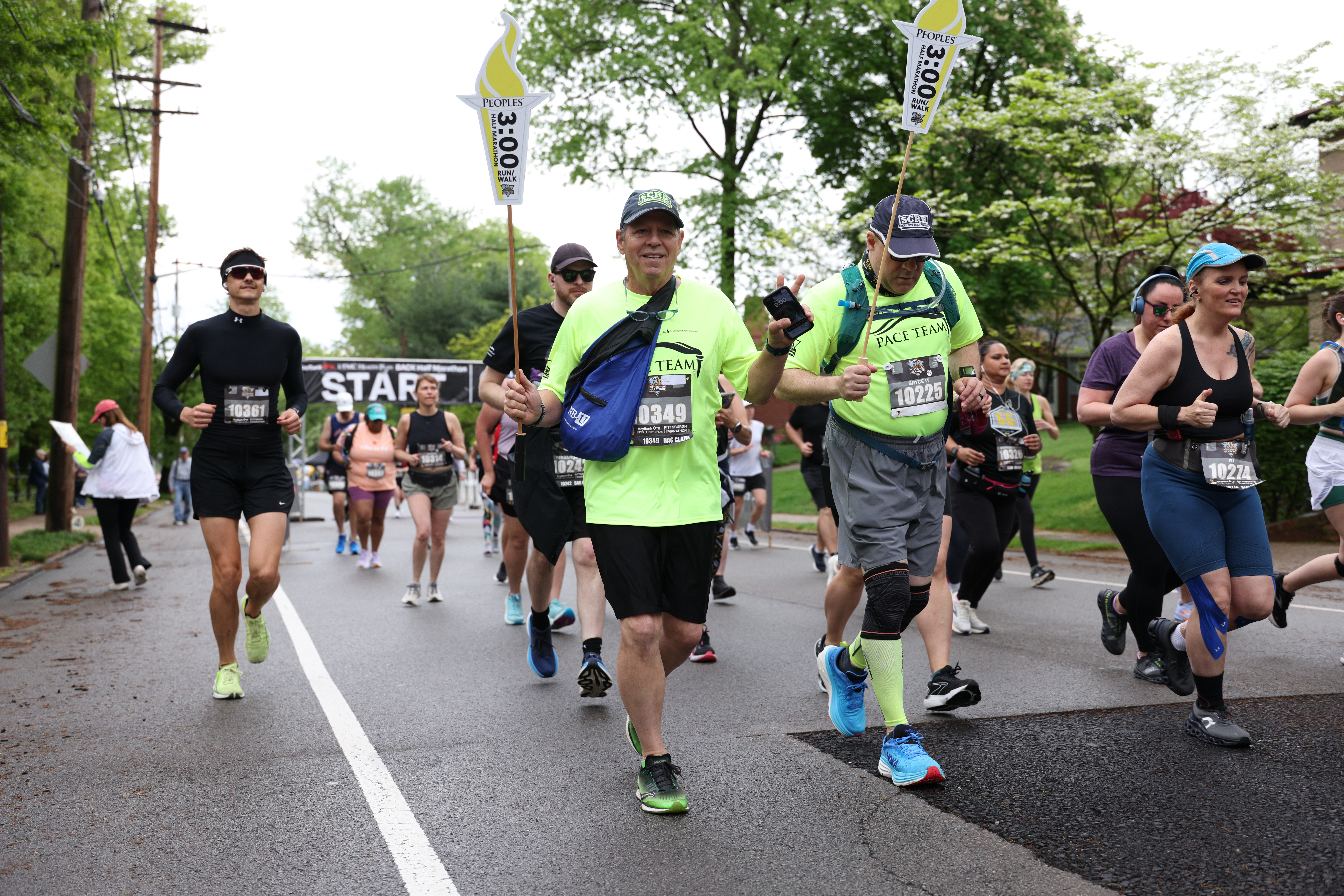 Two three hour pacers running at the start of the BACK Half Marathon.