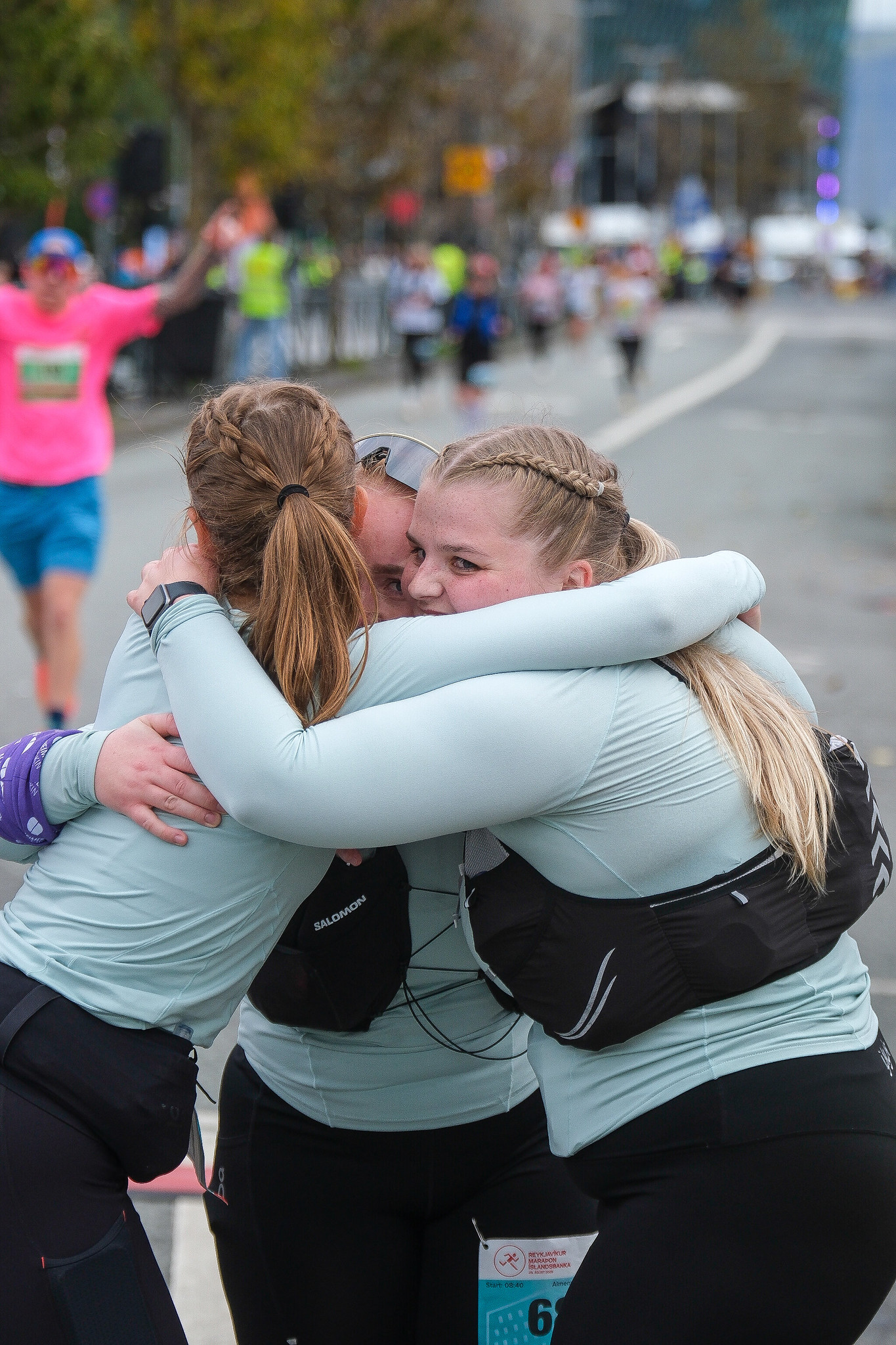 Runners hugging