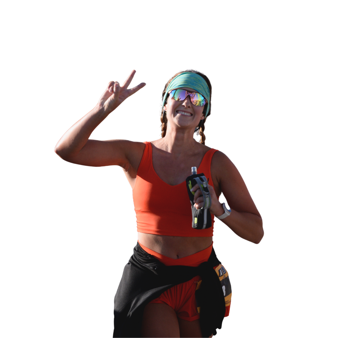 A woman celebrates with a peace sign