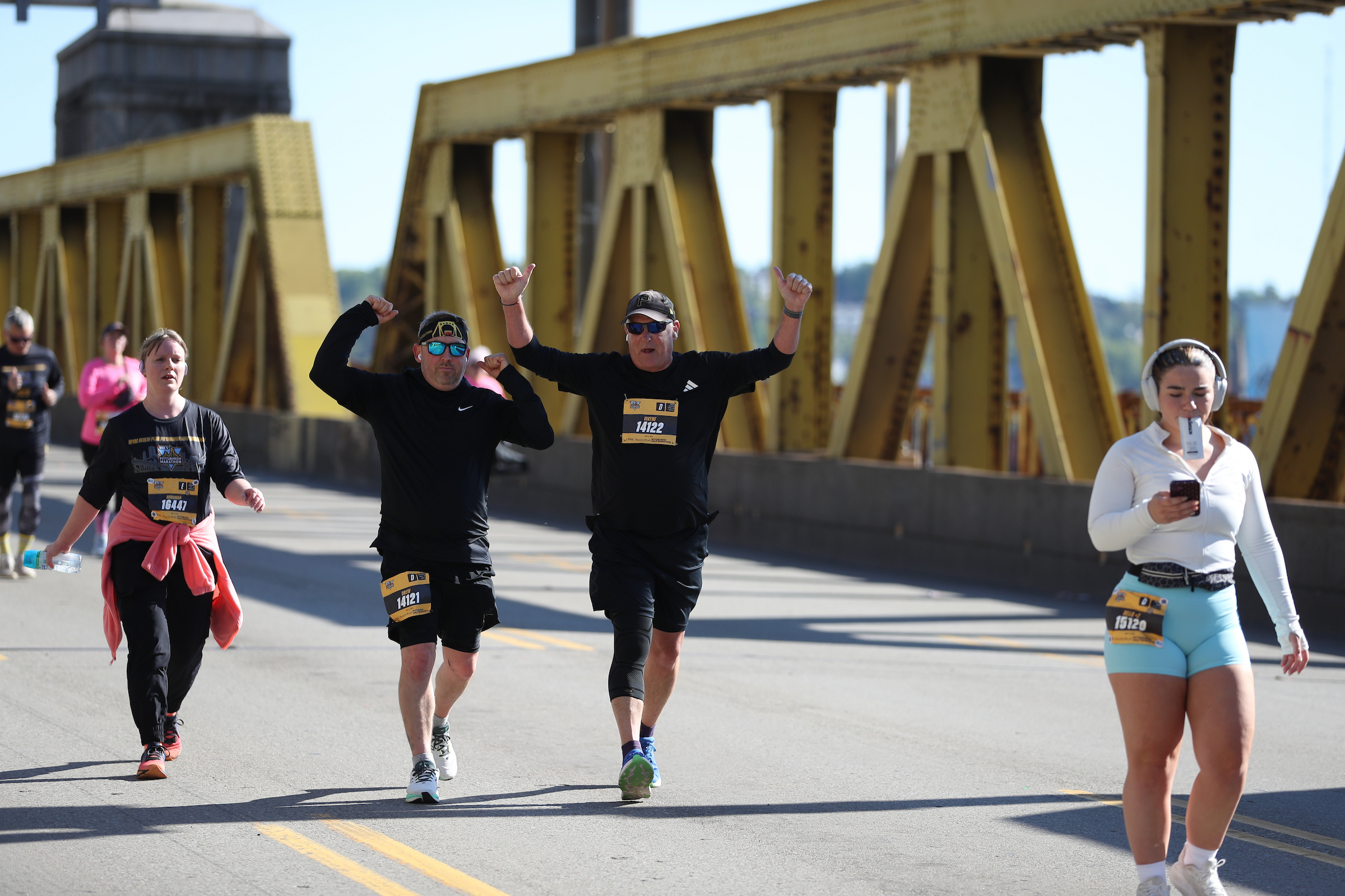 Woman celebrating with Half Marathon medal
