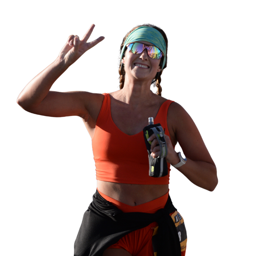 A woman celebrates with a peace sign