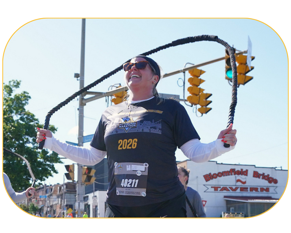 A female participant jump roping during the 4-Mile Fitness Challenge