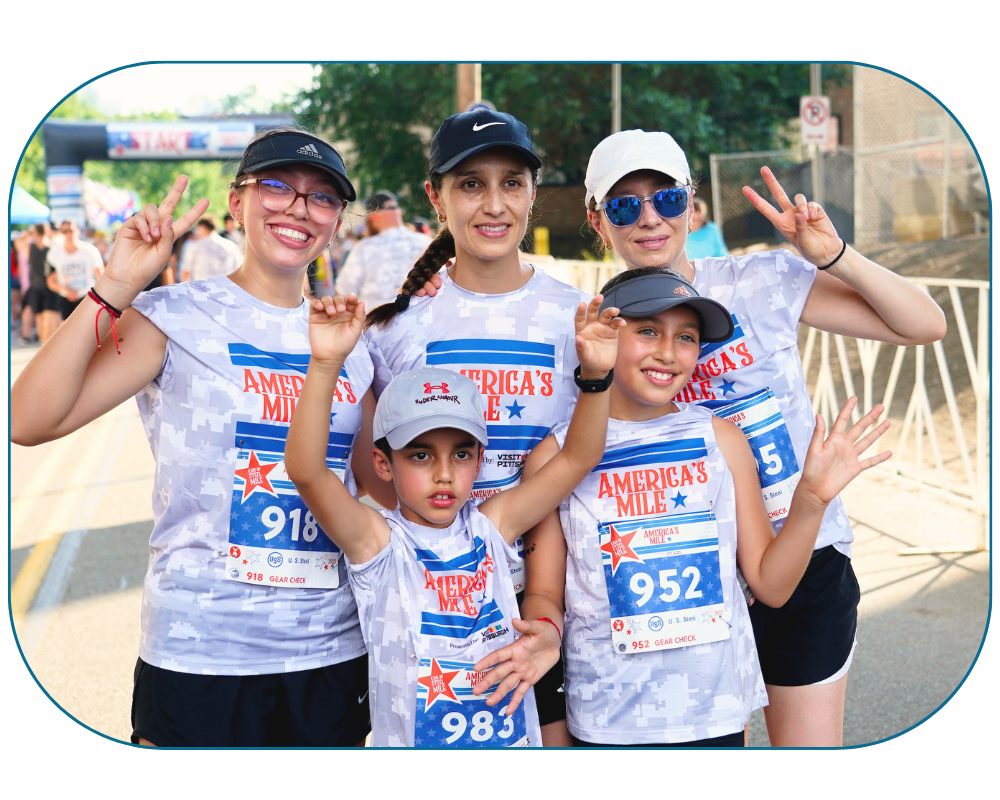 Family smiling at start line
